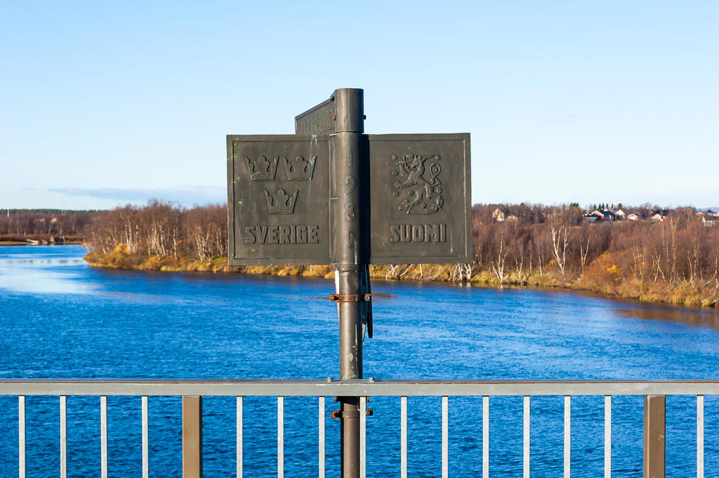 Finland-Sweden border pole on Karesuando Bridge