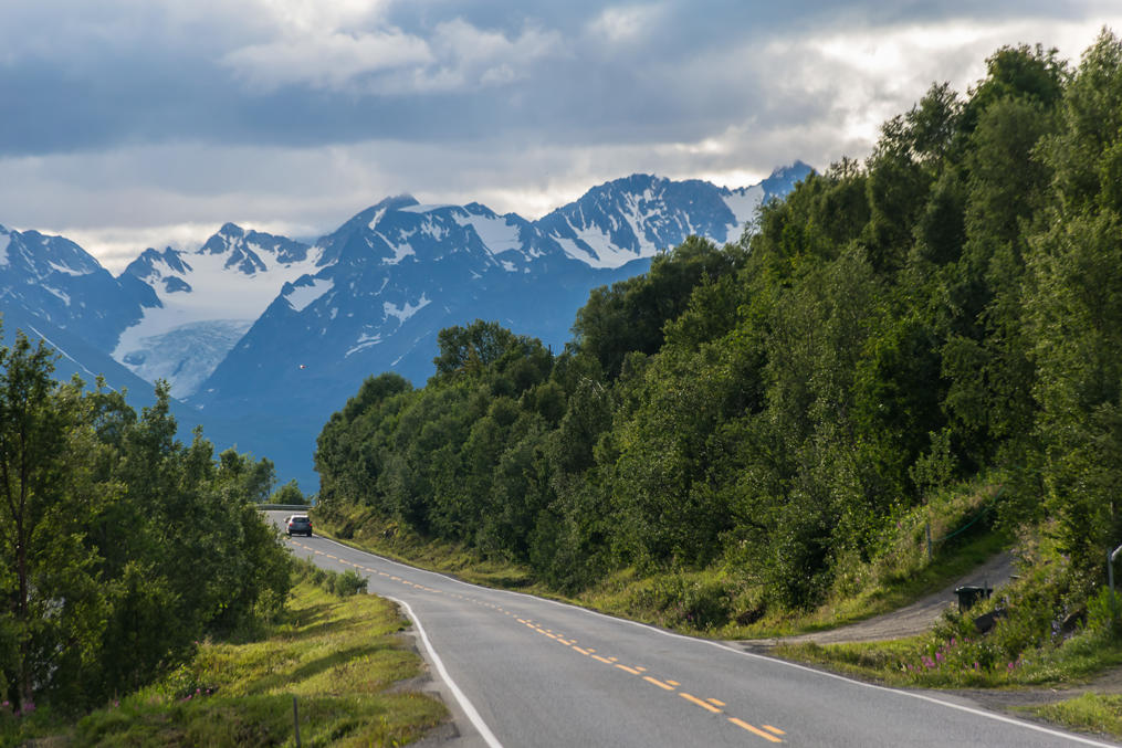 Driving around Lyngenfjorden, with Lyngen Alps in the background