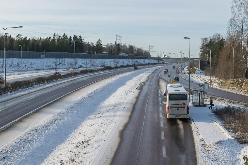 Bus stop at Kehä I ring road-Turku Highway (Turunväylä) interchange.  Buses on such motorways can be faster than metro and trains