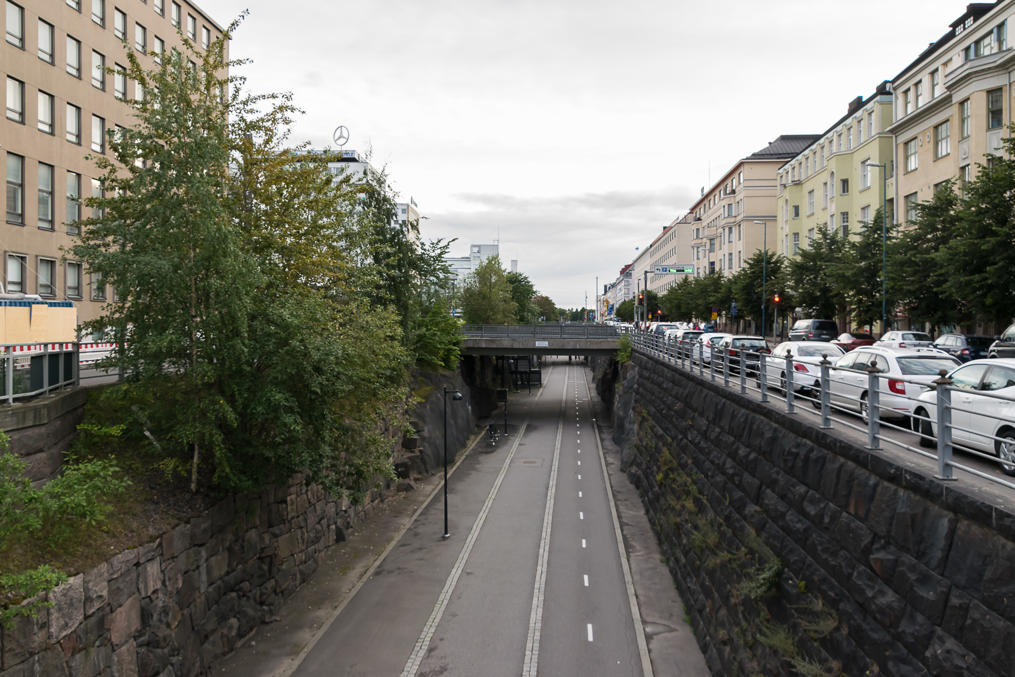 Baana bike track in Helsinki center, conveniently taking the place of an older harbor railroad. While visually striking, this is a one of the kind project