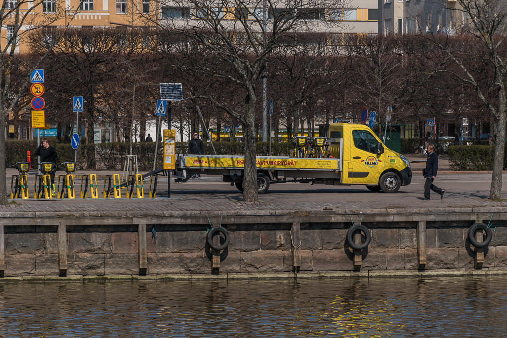 City bikes unloaded at a station in Hakaniemi area in Helsinki in the beginning of the season