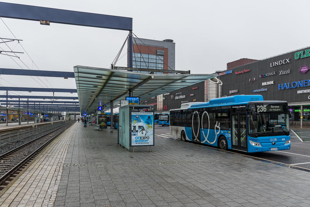 Electric bus at Leppävaara terminal, Espoo.  Note again direct exit from train to buses