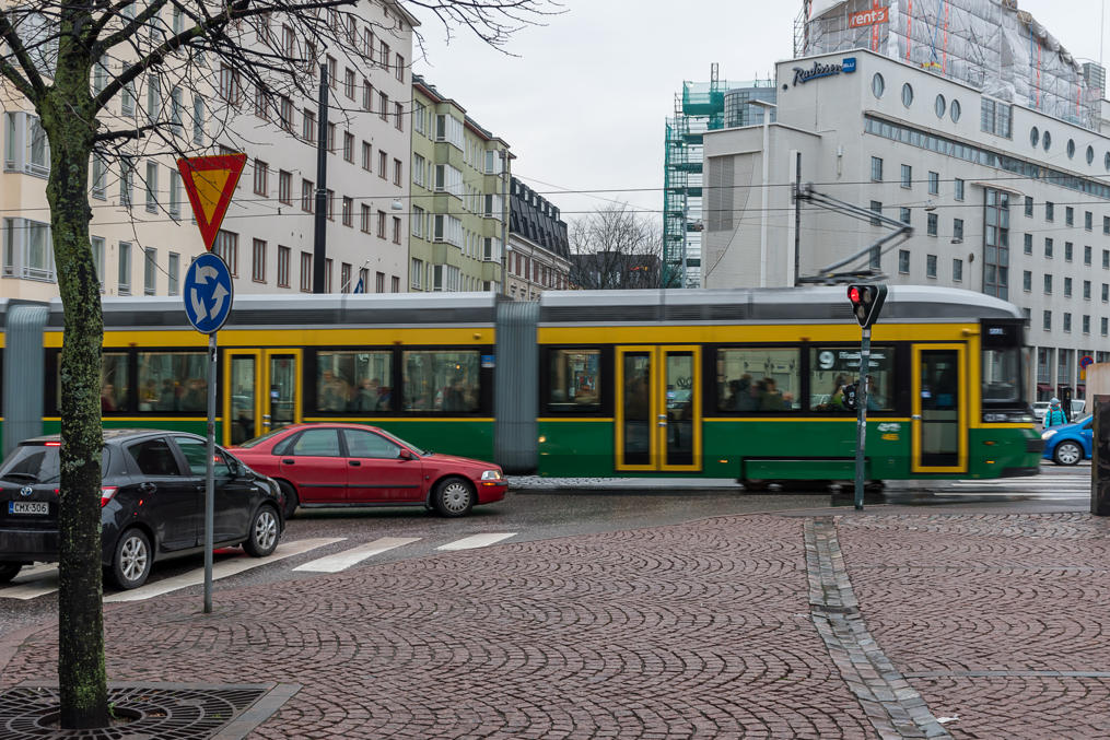 Tram on an inner city street.  Note special traffic lights stopping cars