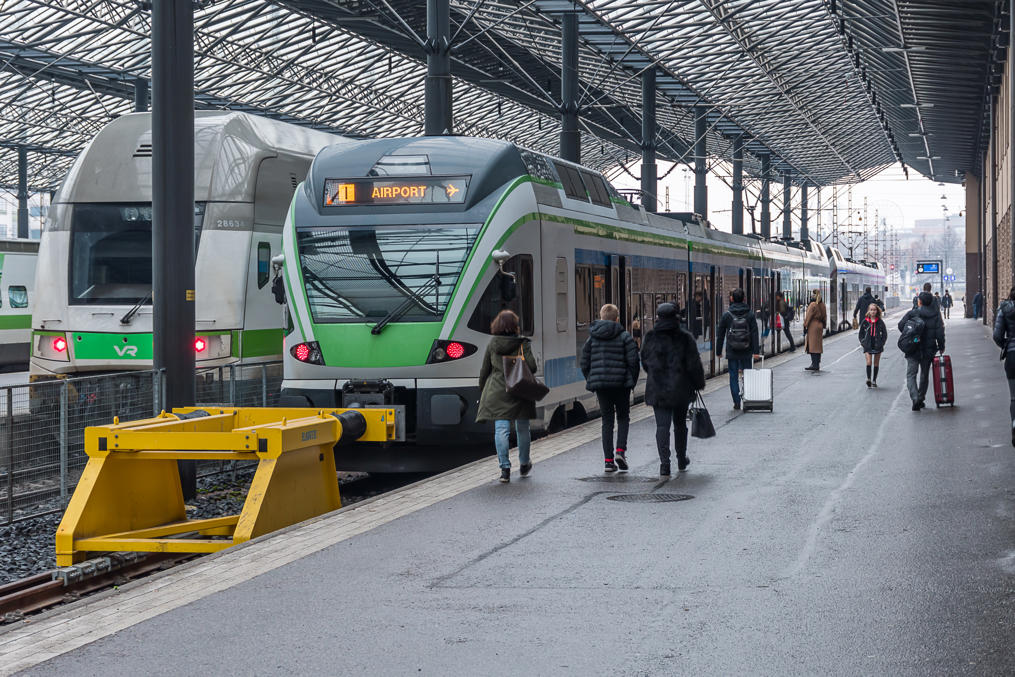 Sm5 train at Helsinki central station.  (InterCity long-distance train to the left)