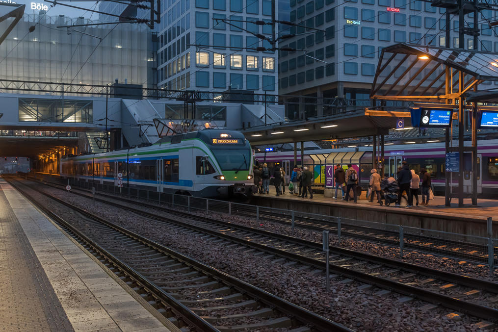 Pasila station platforms.  Note the temporary station building above tracks in front of the much bigger newer one